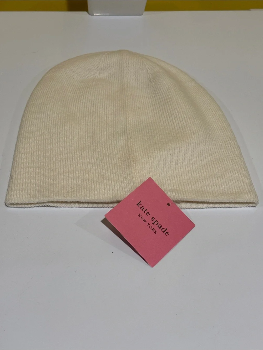 - NWT Kate Spade beanie hat. Color white  One size.